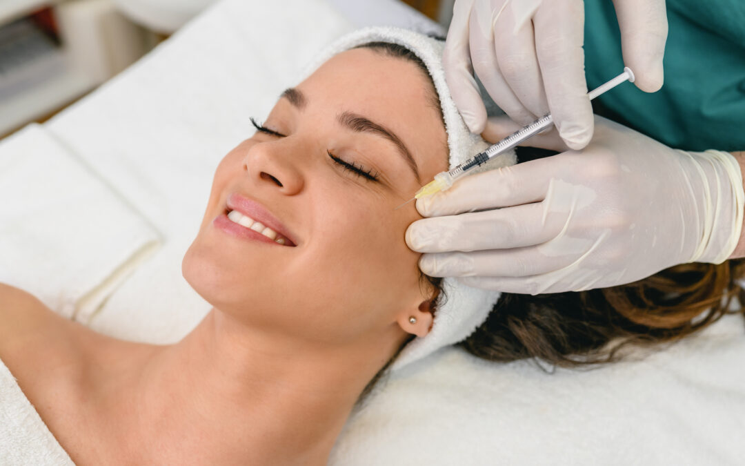 Woman receiving Botox beauty treatment injections