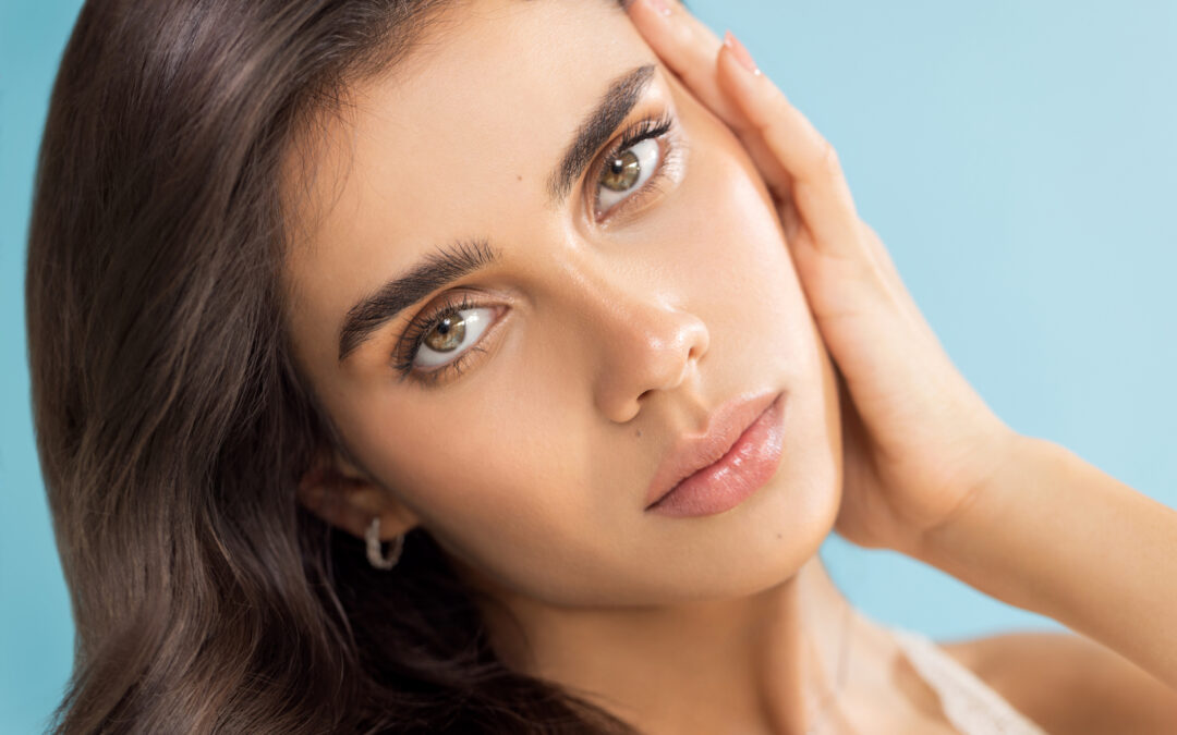 Woman with glowing skin following medspa facial treatment